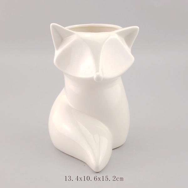 white ceramic fox pen holder