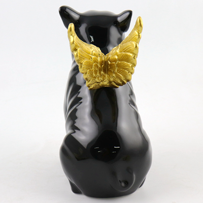 Decorative Ceramic Dog with Metallic Gold Wings